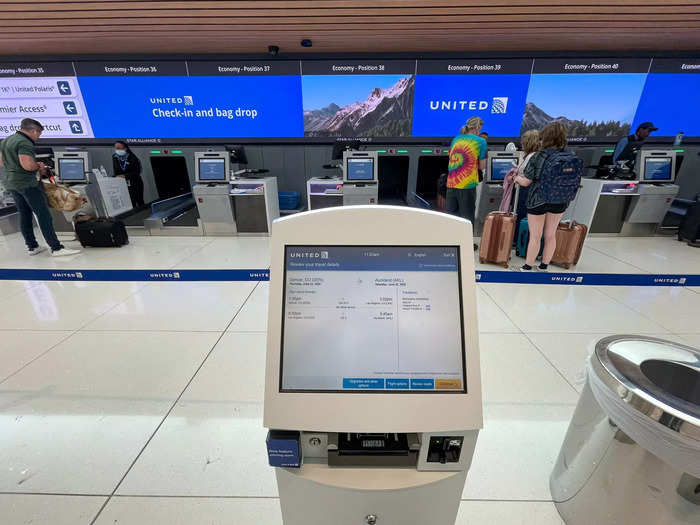 When it came to my United economy flight between Denver and Tokyo, checking in looked drastically different. I used a self-check-in computer and waited in a much longer line for bag dropoffs.