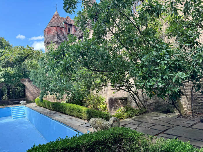 But I was still able to get a good view of the pool, the back of the house, and the lush gardens from behind the gate.