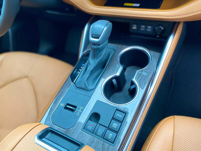 The center console is home to the shifter and controls for various drive modes. 