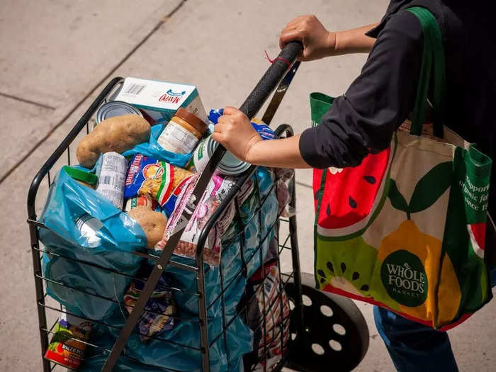 As I walked from the bus stop, I noticed people pushing their own carts, like this one, toward the store. That