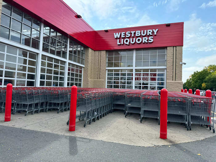 The shopping carts were in front of an attached but separate liquor store. In New York, grocery stores can