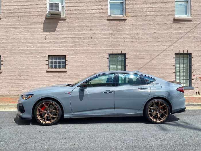 From the side, you immediately notice the TLX