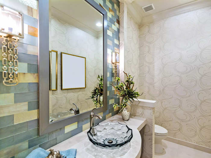 Powder rooms are great opportunities to incorporate fun patterns and bold designs. 