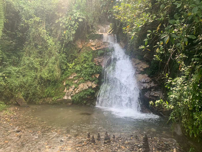 Definitely do a waterfall hike — but make sure you have proper footwear.