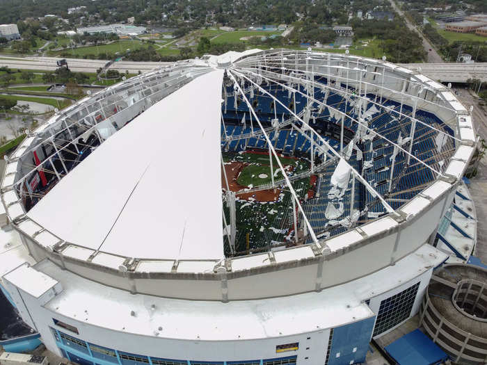 Winds of up to 120 mph ripped through the state, shredding the roof of Tropicana Field, home of the Tampa Bay Rays baseball team.