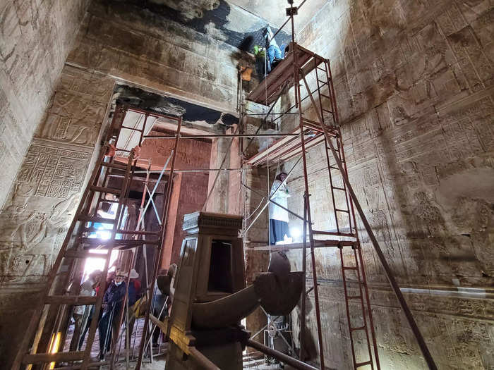 Restorers had to climb up scaffolding to reach the high ceilings.