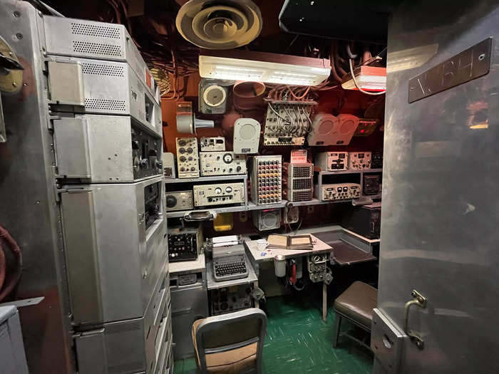 Crew members communicated with other ships in the radio room.