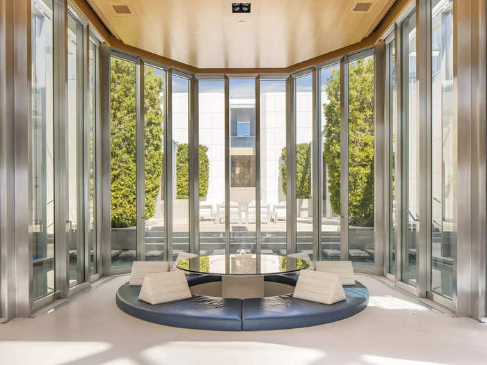 This sitting area is surrounded by glass.