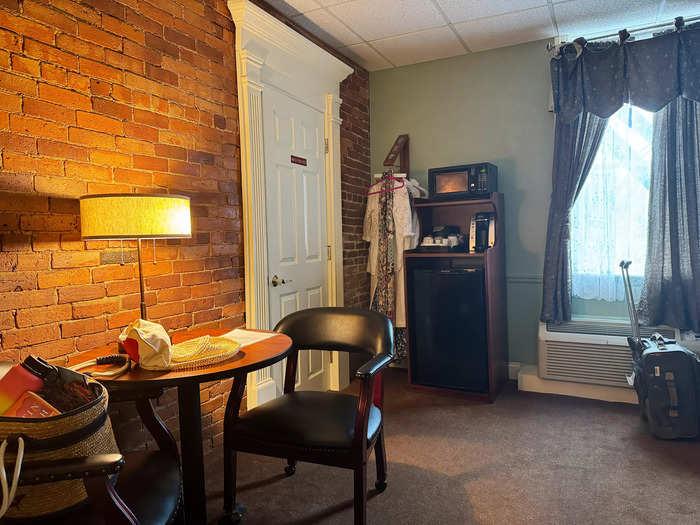 The moldings above the door to the bathroom also made the room feel more historic.