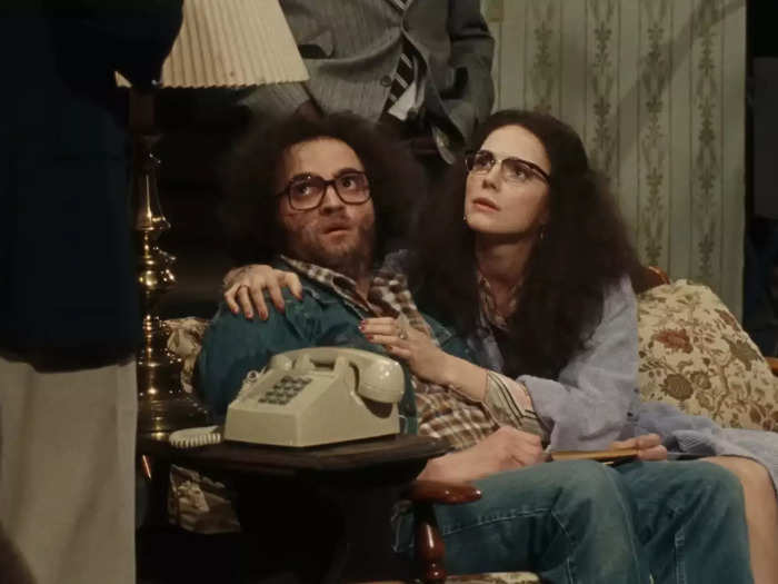 Fiction: The lighting rig fell dangerously close to Belushi and Gilda Radner mid-rehearsal, setting the couch on fire.