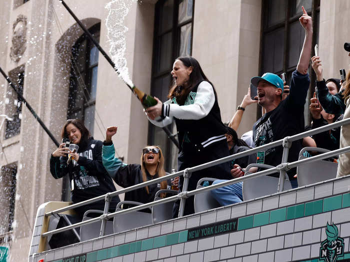 Head coach Sandy Brondello sprayed the crowd with champagne.