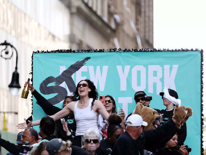 She enjoyed the celebration with fans on a float.