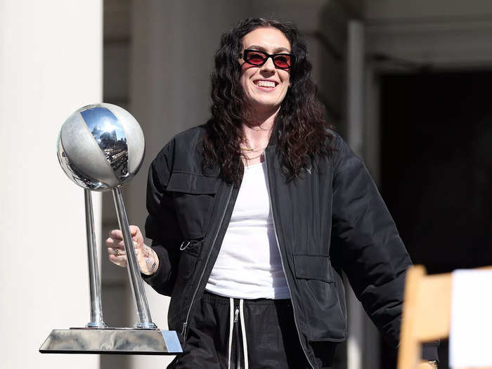 Breanna "Stewie" Stewart smiled with the championship trophy in-hand.