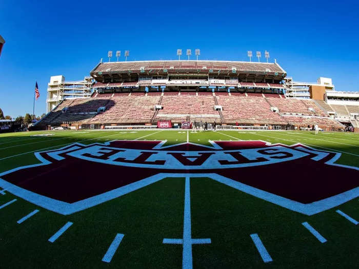 In Mississippi, football fans wave cowbells as the season gets underway.