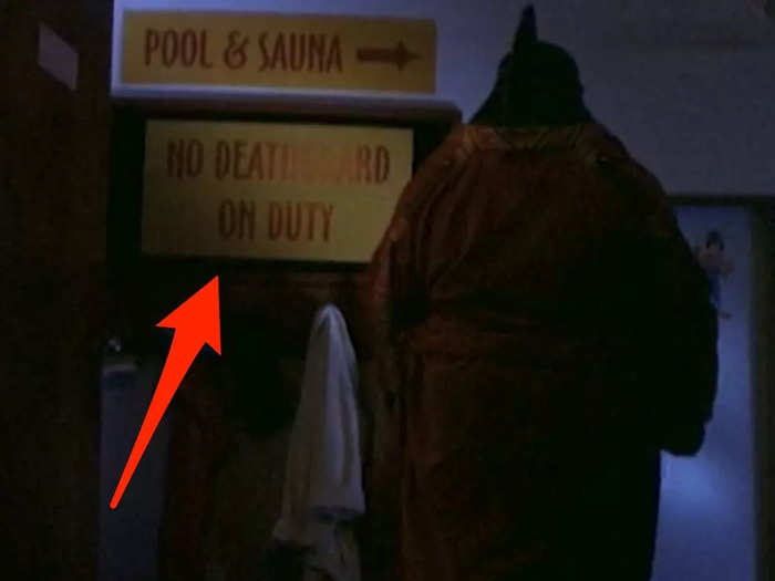 The Halloweentown pool puts a spooky twist on the typical "Lifeguard on Duty" sign.