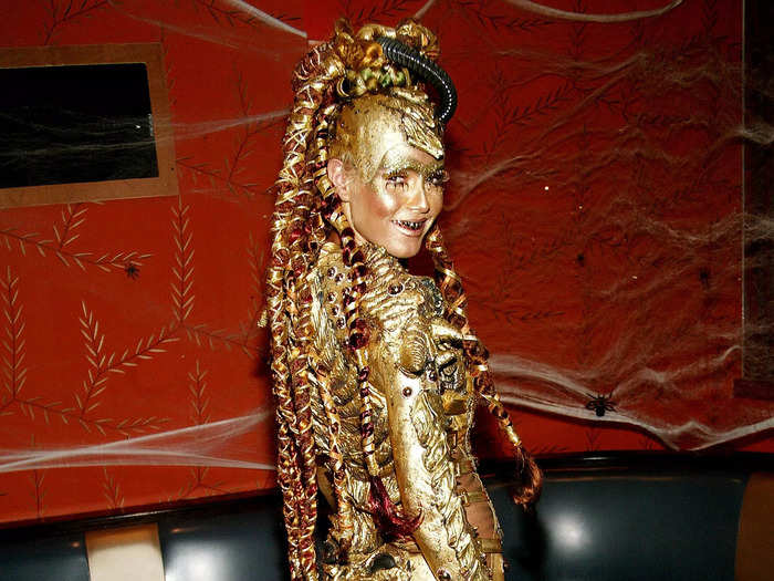 In 2003, Klum dressed up as a golden goddess alien creature.