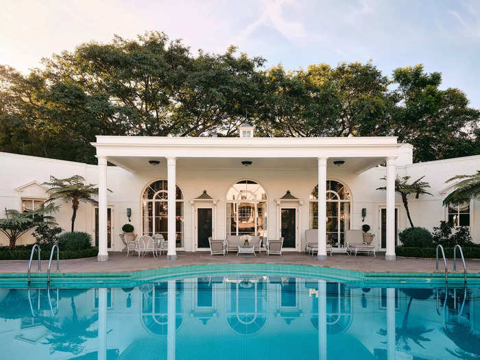 The backyard has a tiled, 60-foot pool and views of Bel Air below.