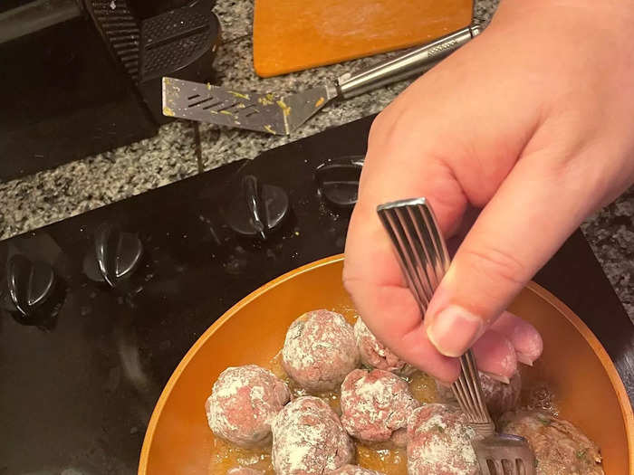 Use two forks to gently rotate each meatball every two minutes. 