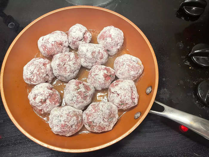 Add the meatballs, one by one, into the pan. 