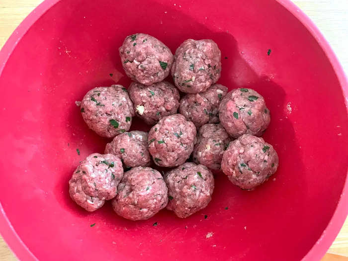 Once your mixture is ready, start shaping the meatballs. 