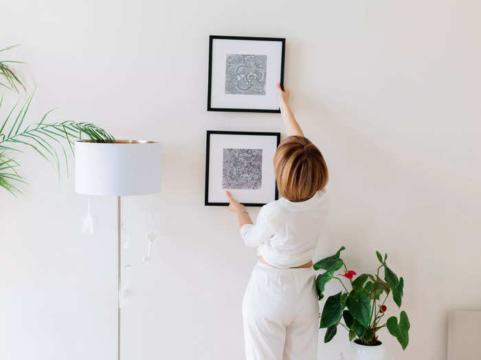 Pass on hanging photos of anyone besides you and your partner.