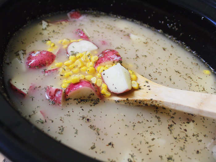 Once the chowder was about 10 minutes away from being done, I added in the heavy cream, milk, shredded chicken, and shredded cheddar cheese.