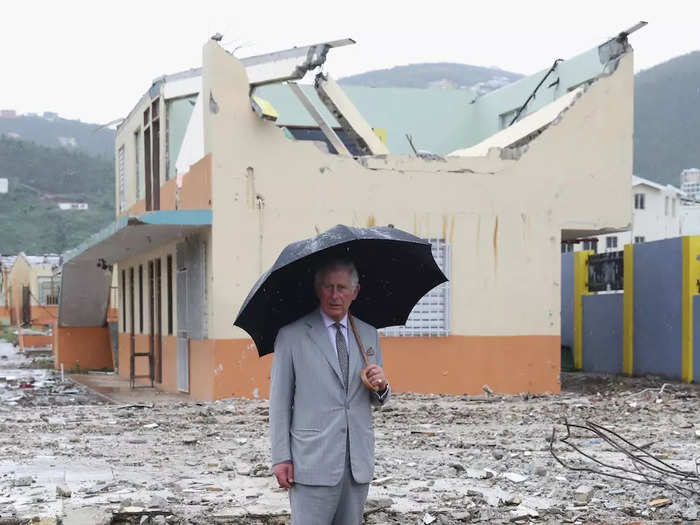 2017: In November, Charles spent three days visiting the Caribbean islands that were hit by earthquakes in September. Here, he surveys the devastation in Barbuda.