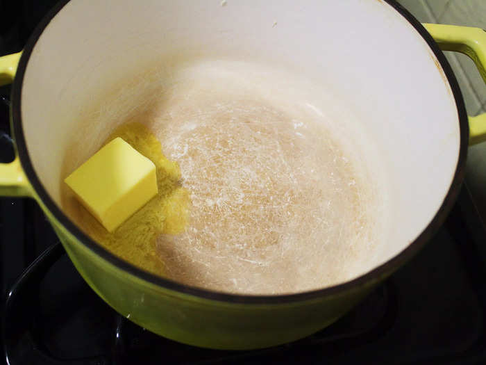 I started off by melting a few tablespoons of unsalted butter in a pot on the stove.