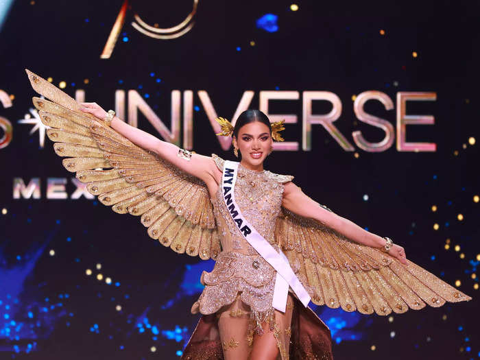 Miss Myanmar Thet San Andersen spread her gold wings in tribute to the owl. 