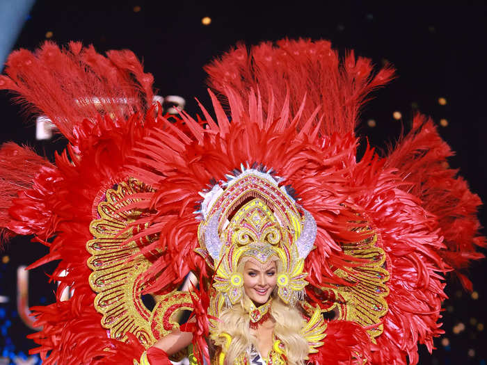 Miss Denmark Victoria Kjær Theilvig transformed into a Viking goddess in her red and yellow costume.