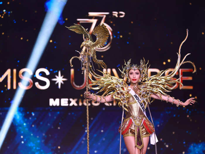 Miss Indonesia Clara Shafira Krebs embraced the energy of a warrior with a statement shoulder piece and bird-topped staff.