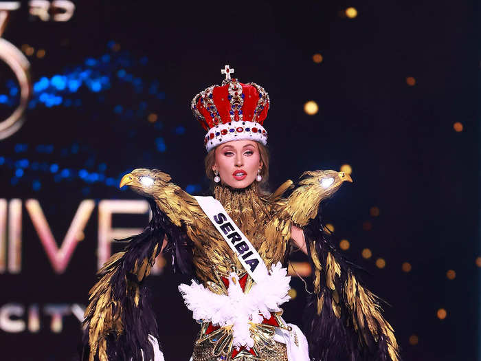 Miss Serbia Ivana Trisic looked like royalty when she arrived wearing a feather-covered coat and statement crown.