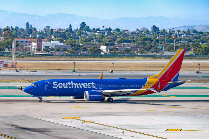 Gunfire hit a Southwest Airlines plane as it prepared for takeoff in Dallas