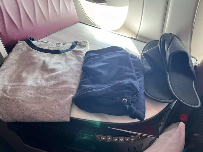 Flight attendants handed out bags containing pajamas from The White Company.