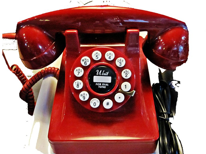 The symbol comes from this type of rotary dial phone, which hasn