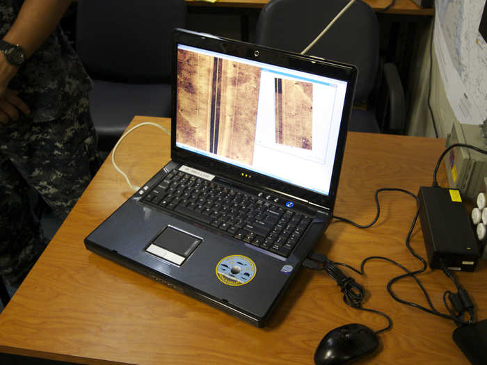 Finally the dive master shows me an example of the 60-meter-wide side scan sonar picture picked up by the REEMUS