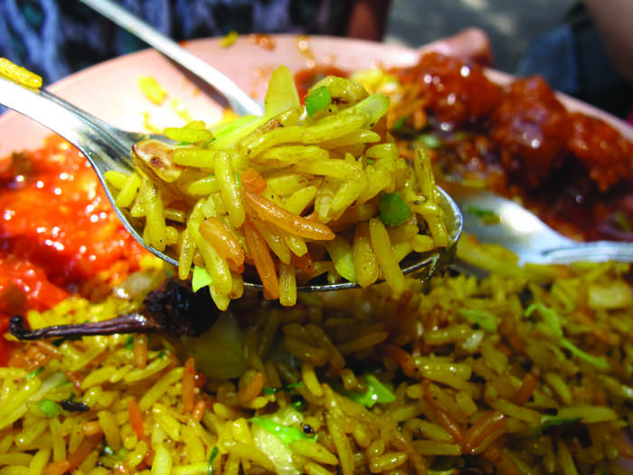 India brings us a garlic chicken accompanied with tamarind herb rice.