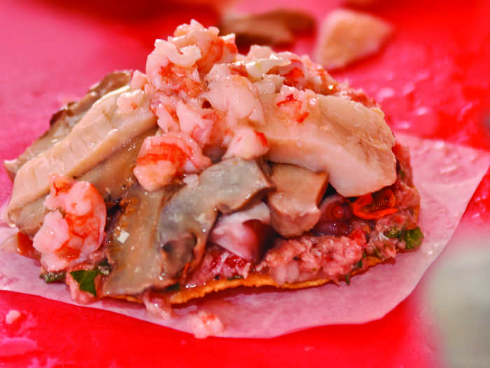 The tostada, from Mexico, is a crunchy flat bread topped with fresh seafood and a complimentary salsa.