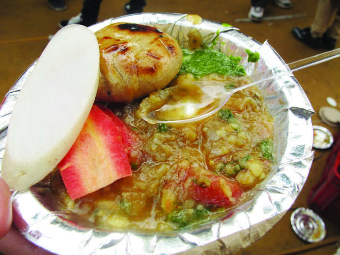 Try this warm and comforting Litti Chokha from India, a spiced and baked dough ball spread with a mash of potatoes, tomatoes, and eggplant.