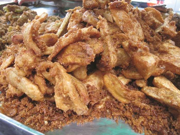 Top off your taste tour with these Thai banana fritters, dipped in a sesame batter and deep fried to perfection in coconut oil. Heaven on a plate.