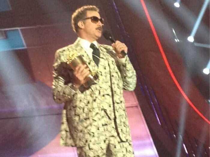 Will Ferrell accepted the Comedic Genius award in a money suit.