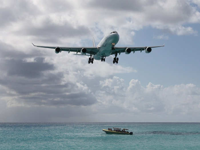 For years, tourists have been putting their towel down on Maho Beach to experience this.