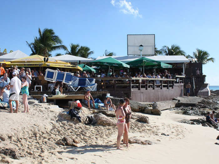 The beach caters to vacationers with restaurants and is a destination for people all over the world.