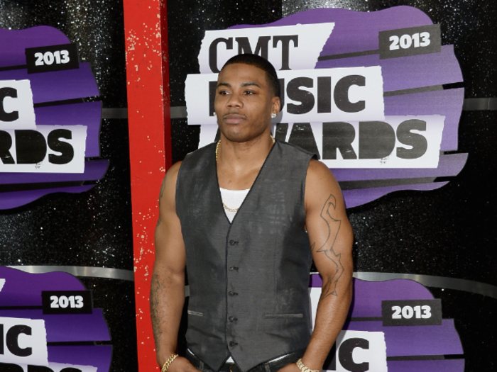 Rapper Nelly looked slightly uncomfortable on the red carpet.