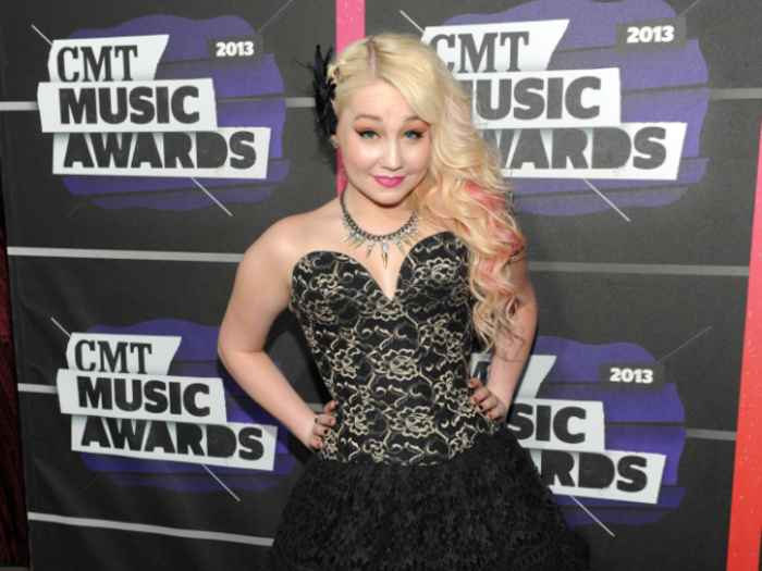 "The Voice" alum Raelynn paired her tutu with cowboy boots.