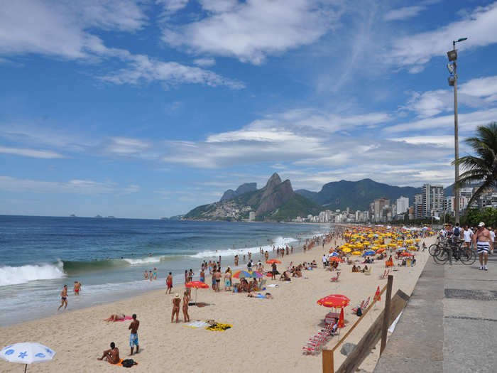 Beautiful bodies fill Ipanema Beach in Rio de Janeiro, Brazil, where people drink cachaca, play volleyball, sunbathe, and just look pretty.