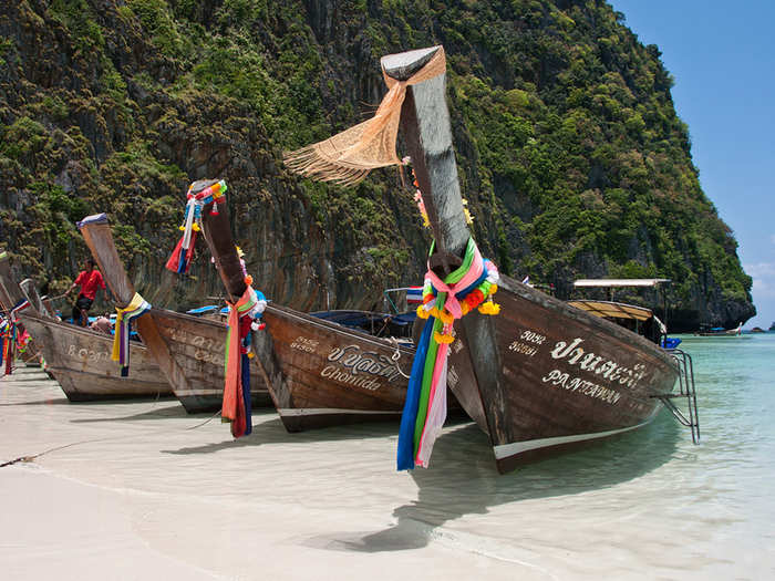 The beaches in Ko Phi Phi, in Southern Thailand, are sheltered by limestone cliff formations that make for a calm surf. Skip the touristy crescent-shaped Maya Bay (which was featured in the film "The Beach") and head to the less-known but equally gorgeous Ao Ton Sai or Bamboo Island.