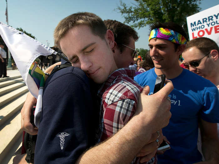 Chase Hardin and friend Kai Neander shared an embrace in celebration of the rulings.