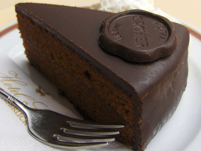 Treat yourself to a sachertorte—a rich, dense chocolate cake—in Vienna, Austria. The city is renowned for its elegant and historic pastry shops, like Cafe Landtmann and Demel.