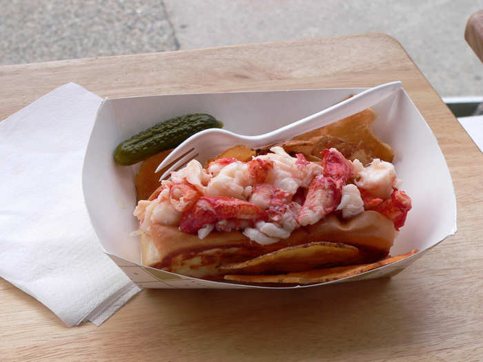 Savor a succulent and juicy lobster roll in Bar Harbor, Maine.